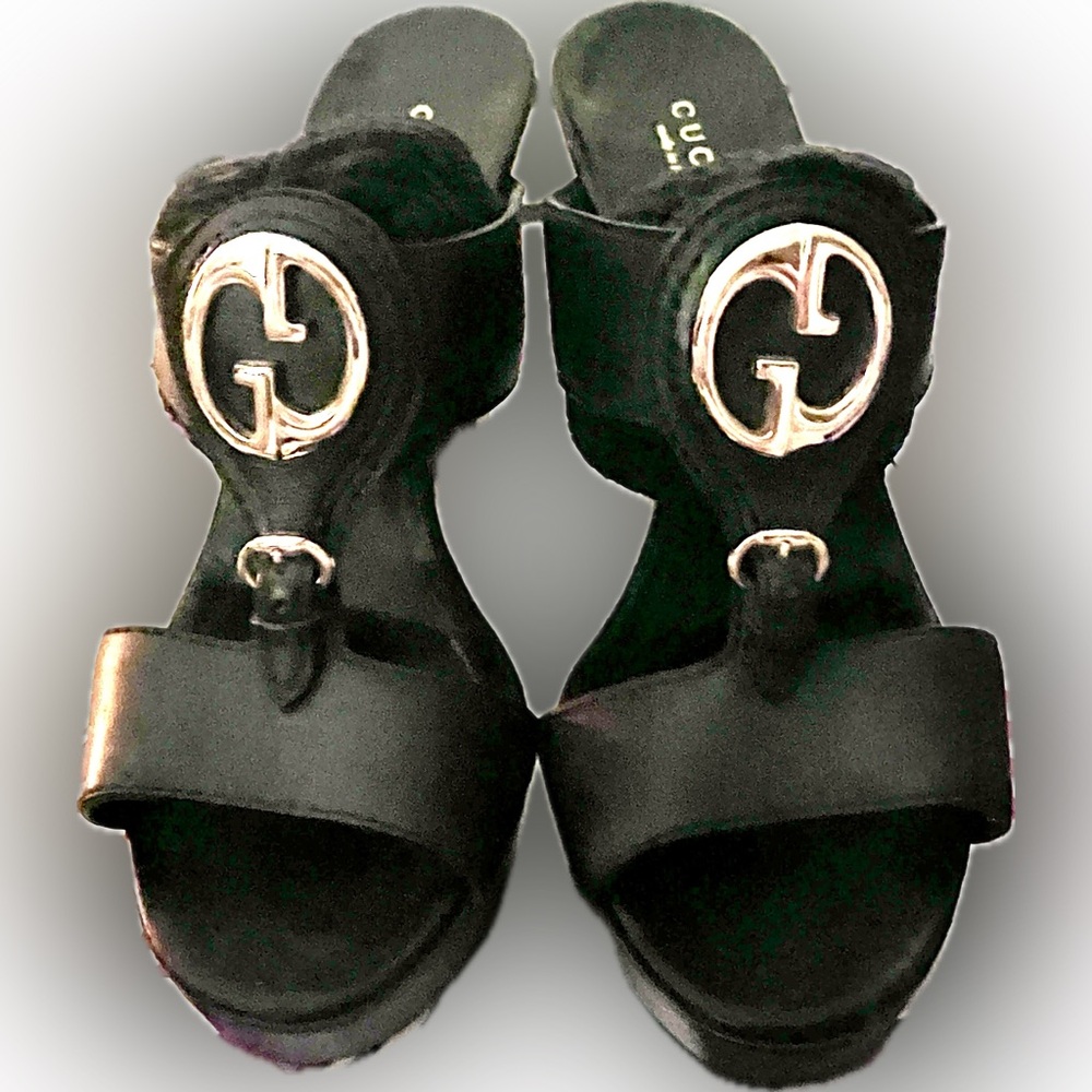Gucci open toed “slip on” with a 4” heel in size 7 1/2. They are gorgeous!